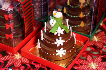 Delicious Christmas sweets, cakes and candys. Christmas decorate table. With Santa Claus, bear and others