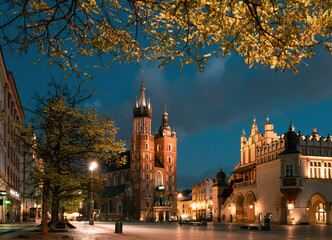 Fototapeta Krakow attractions in market square in the evening. Symbol of Krakow, Poland Europe. obraz