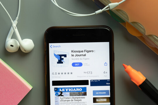 New York, USA - 1 December 2020: Kiosque Figaro mobile app icon on phone screen top view, Illustrative Editorial