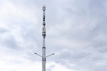 5g station reciever, modern city telecommunication agains the sky