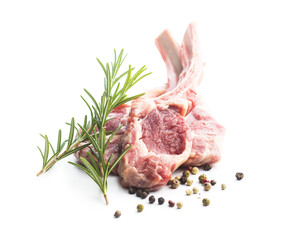 Slices raw lamb chops with salt, pepper  and rosemary