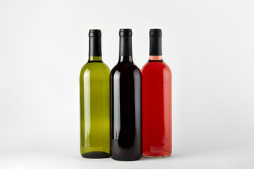 bottles of wine of different types isolated on a white background