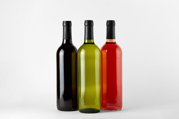 bottles of wine of different types isolated on a white background
