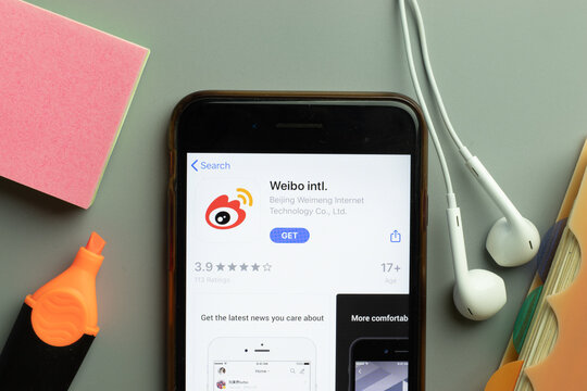 New York, USA - 1 December 2020: Weibo Intl mobile app icon on phone screen top view, Illustrative Editorial