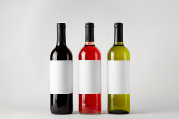 Mockup. Bottles of wine of different types isolated on a white background.