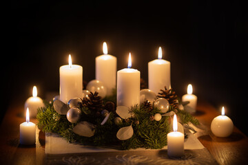 Advent wreath with burning candles christmas balls and decorations