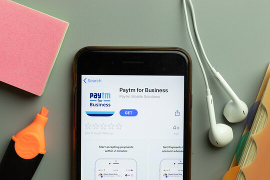 New York, USA - 1 December 2020: Paytm for Business mobile app icon on phone screen top view, Illustrative Editorial