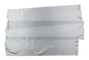 Torn pieces of silver grey adhesive duct tape isolated on white background.