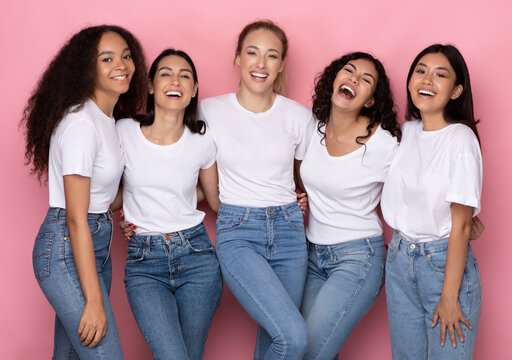 Five Positive Millennials Ladies Hugging Posing Together In Studio