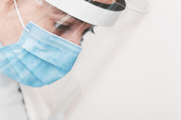 Female doctor wearing protective equipment