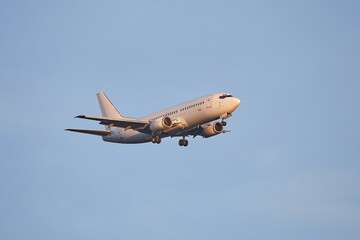 Airplane landing with blank white body