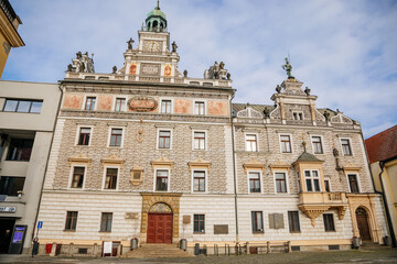 Obraz premium Main town Charles' square with renaissance historical medieval town hall in Kolin, Sgraffito wall decor on the facade, Central Bohemia, Czech Republic