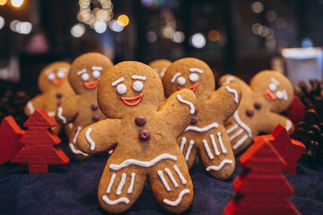 Christmas greeting card with gingerbread cookies and xmas background. Copy space for your greetings