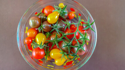 bowl of multi color cherry tomatoes from above/cherry tomatoes