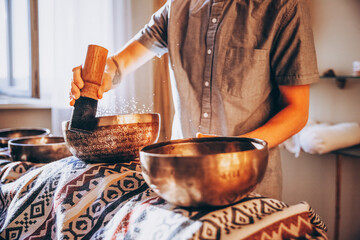 Tibetan copper bowl for meditation, close-up photo 
