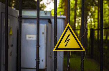 High voltage sign at sunset. top view.