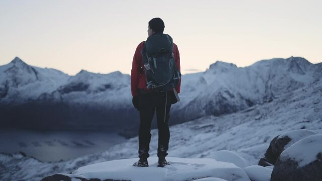 Hiker On Mountain Looking At View