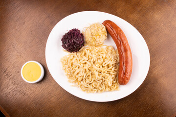 Oktoberfest meal with sausage and german spätzle