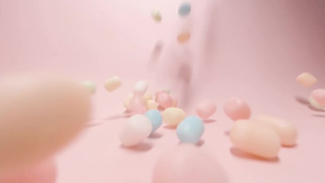 Lots of colored candy bars falling from high places