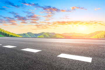 Naklejka premium Country asphalt road and green tea plantation with bamboo forest natural landscape.