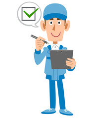 点検および確認する作業スタッフの男性
