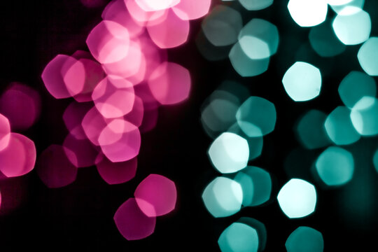 Pink and cyan modern bokeh lights. Urban defocused backdrop for inserting text