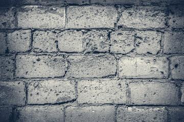 Wall made of big rough concrete blocks as background.