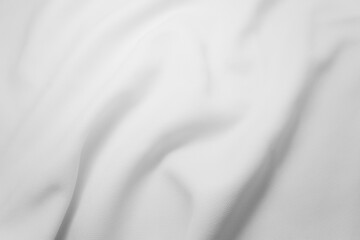 Rippled white cloth background. Fabric texture.
