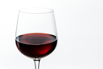 Wine glass with red wine closeup