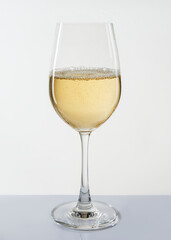 Wine glass filled with white wine