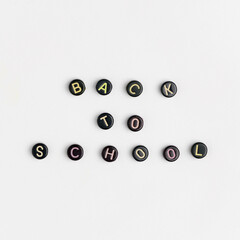 Black BACK TO SCHOOL beads message typography
