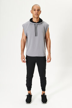 Man In A Gray Sleeveless Hoodie Mockup