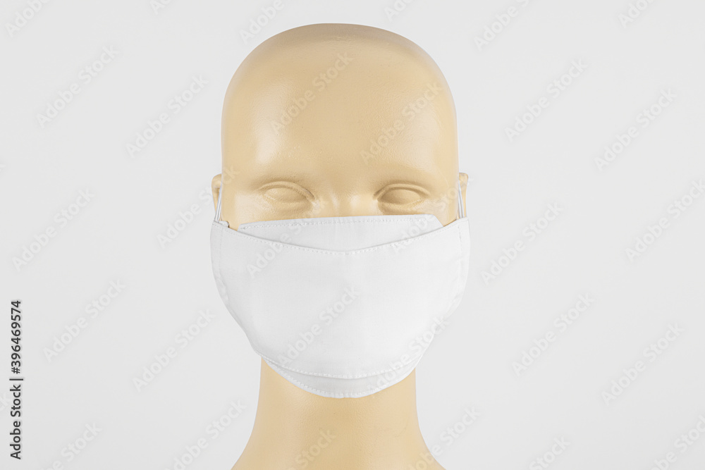 Poster White fabric face mask on a mannequin