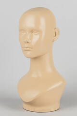 Flesh tone mannequin head in profile mockup