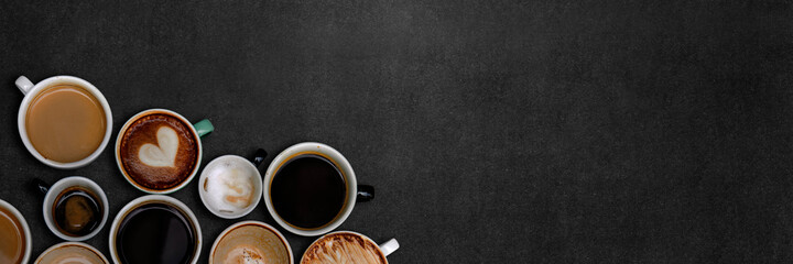 Coffee cups on a black textured wallpaper.