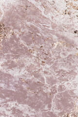 Pink and gold marble textured background