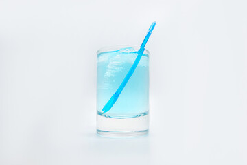 blue alcoholic drink in a decanter. Cocktail with blue gin , tonic