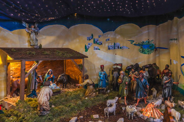 Traditional nativity scene with holy family in bethlehem at Christmas market