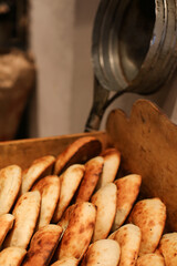 Flat cakes from tandoor on market counter in Bishkek, Kyrgyzstan