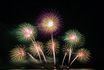 Fototapeta premium fireworks over the beach in Thailand,New year eve 2020 Pattaya firework Festival
