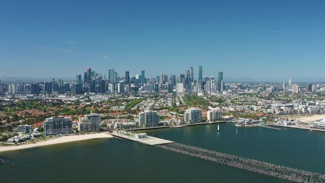 Aerial video of flying towards Melbourne CBD and coastal suburb