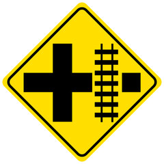 Highway rail crossing on side road to right yellow sign on white background