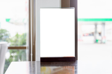 Blank flyer mockup glass plastic transparent holder poster display in coffee shop