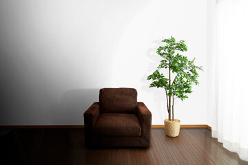 ソファーと観葉植物がある広い部屋__孤独感