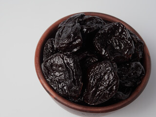 Dried plum - prunes isolated on a white background