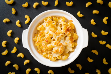 American mac and cheese, macaroni pasta in cheesy sauce
