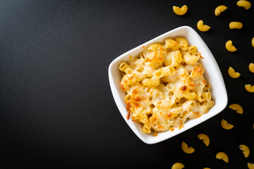 American mac and cheese, macaroni pasta in cheesy sauce