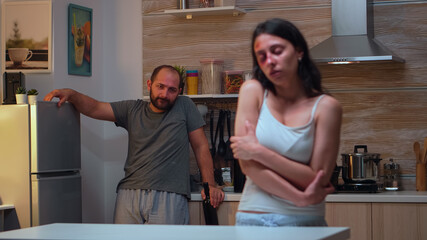 Woman being afraid of drunk husband, tolerating his violence. Traumatised abused terrified beaten...