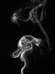 Fototapeta premium White natural steam smoke effect on solid black background with abstract blur motion wave swirl use for overlay in pollution, vapor cigarette, gas, dry ice, warm hot food, boil water smoke concepts
