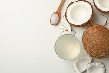Fototapeta na wymiar Fresh coconut and coconut milk on white background